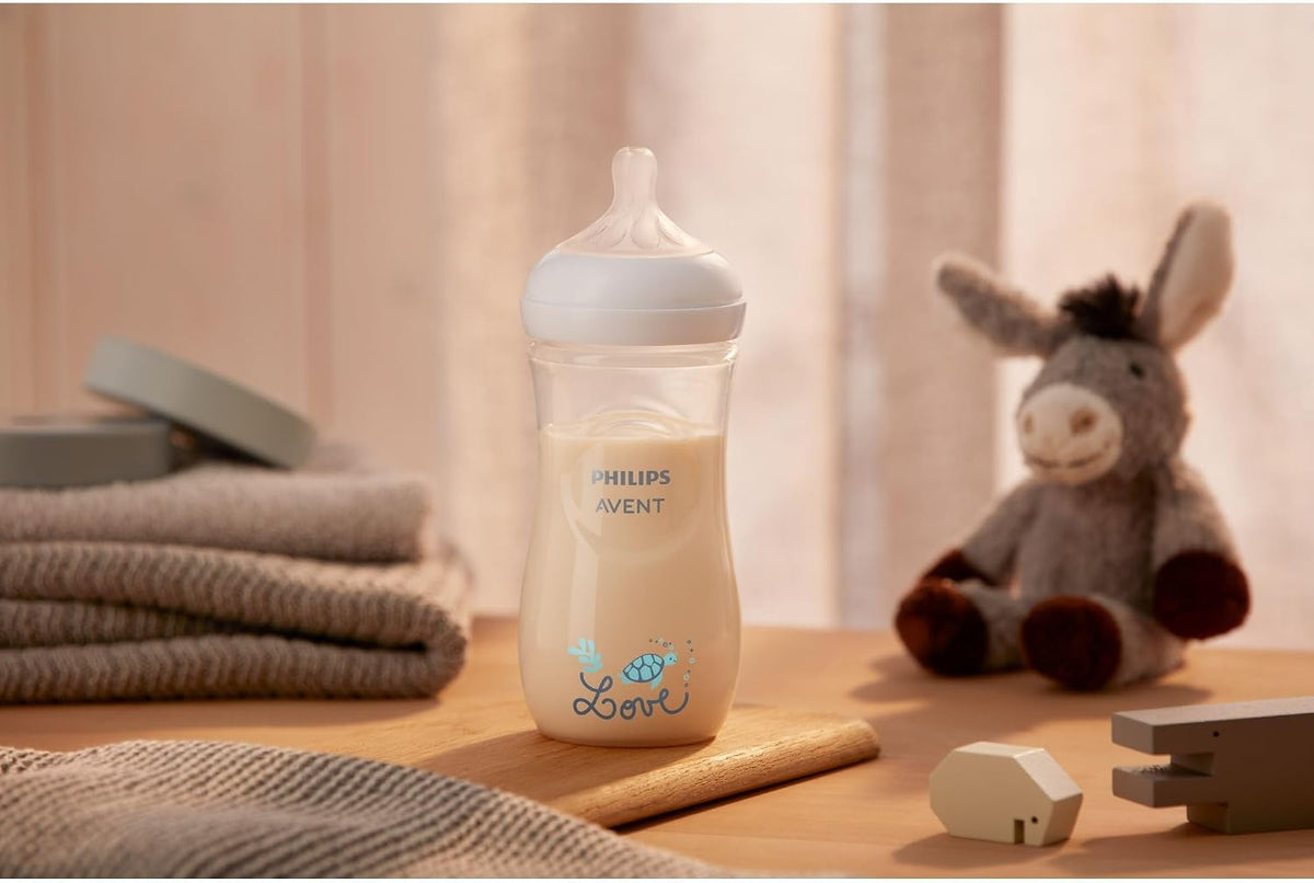 Philips AVENT Natural Response Baby Bottle 330 ml with Flow Rate 4, Teat from 3 Months (SCY906/11) — transparent