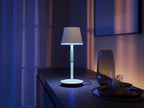 Philips Hue White & Color Ambiance Go Portable Table Lamp (530 lm), Dimmable Table Lamp for Hue Lighting System with 16 Million Colours, Smart Light Control via Voice or App, White — black